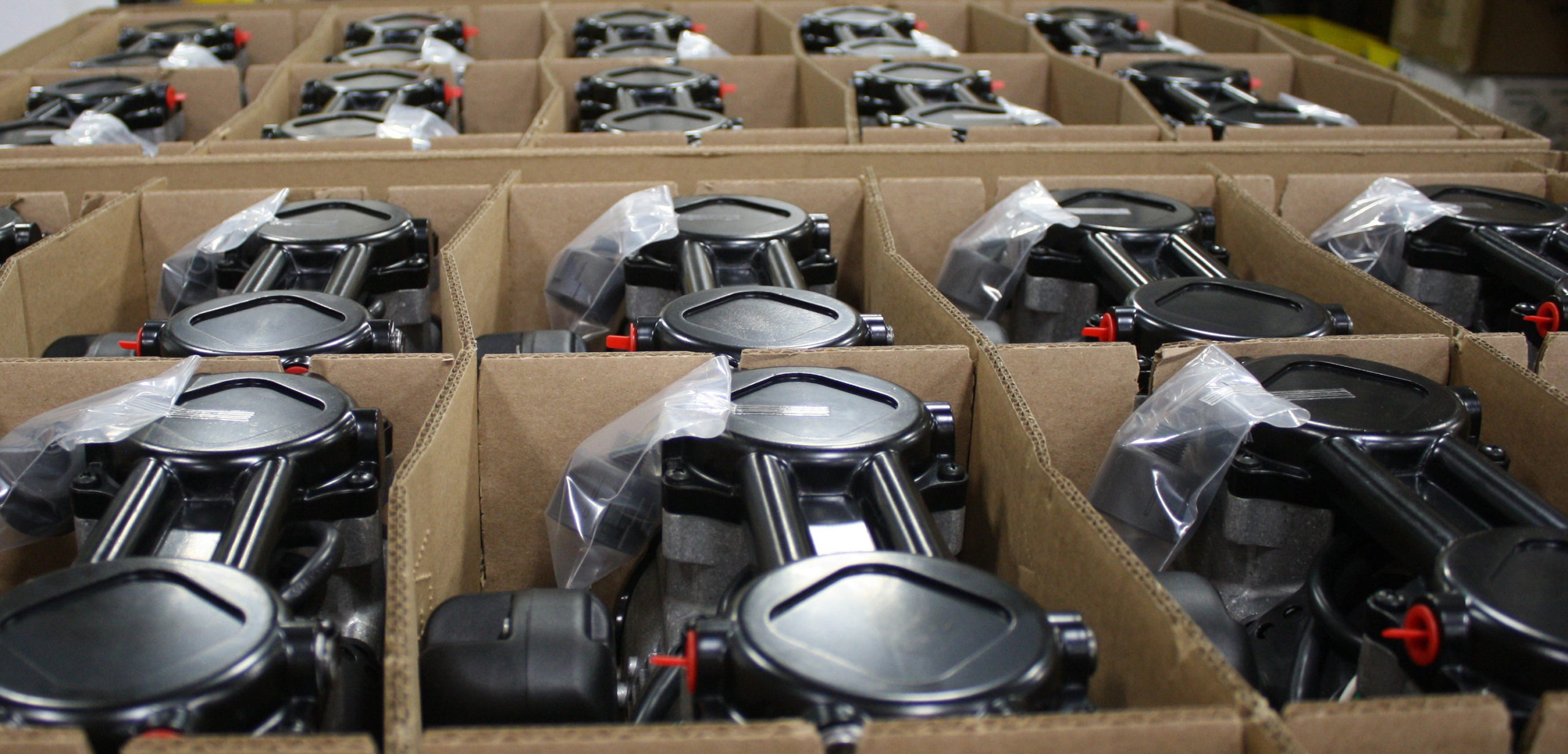 Air compressor and vacuum pumps in a box ready for delivery